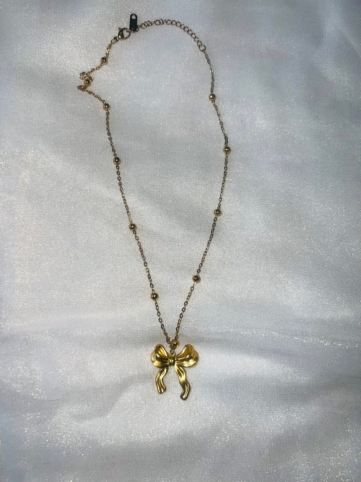 Golden Bow Charm Necklace